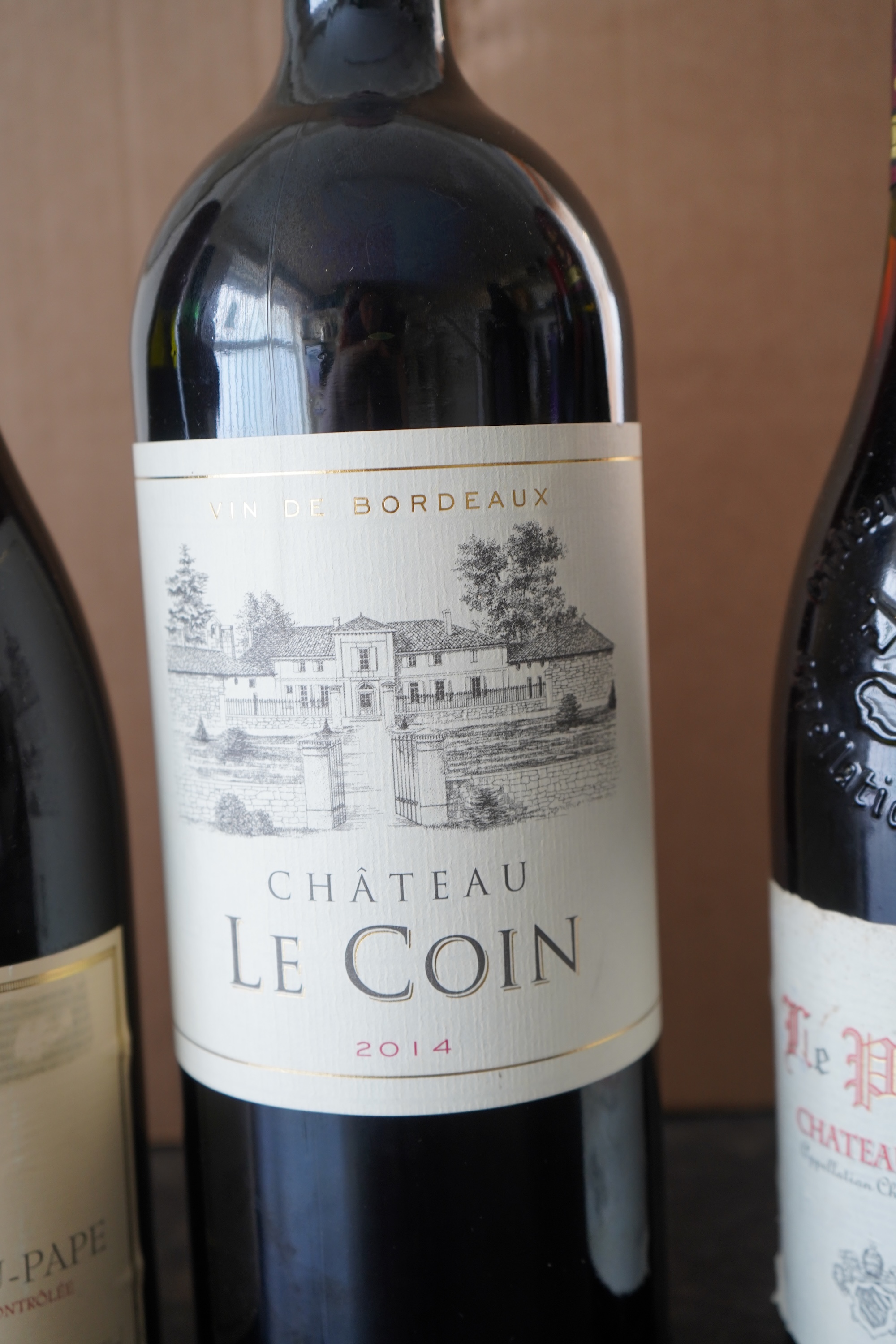 A Magnum of 2014 Chateau Le Coin Bordeaux, three bottles of 1998 Gerard Bertrand Cigalus and five others.